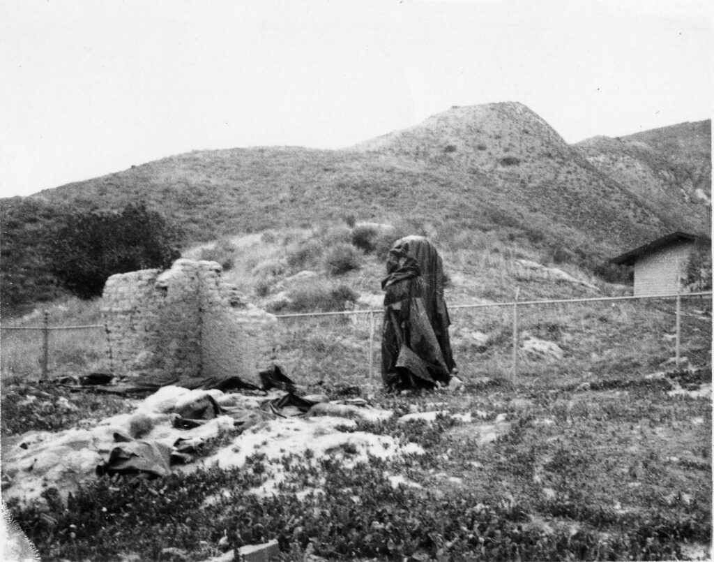 Black and white photo of Tapo Adobe Ruins in the 1970s, showing a partial adobe wall.