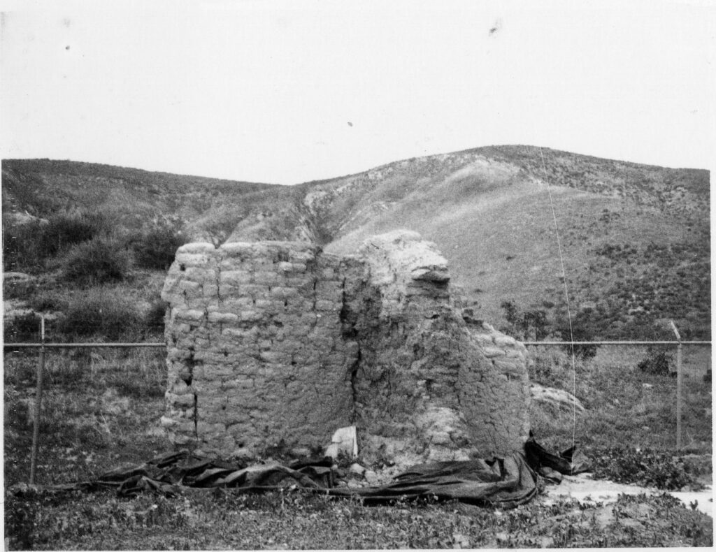 Black and white photo of Tapo Adobe Ruins in the 1970s, adobe wall remains.